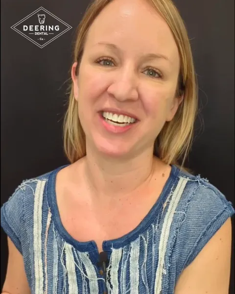 Katrina, an Invisalign guest at Deering Dental, smiling after her treatment